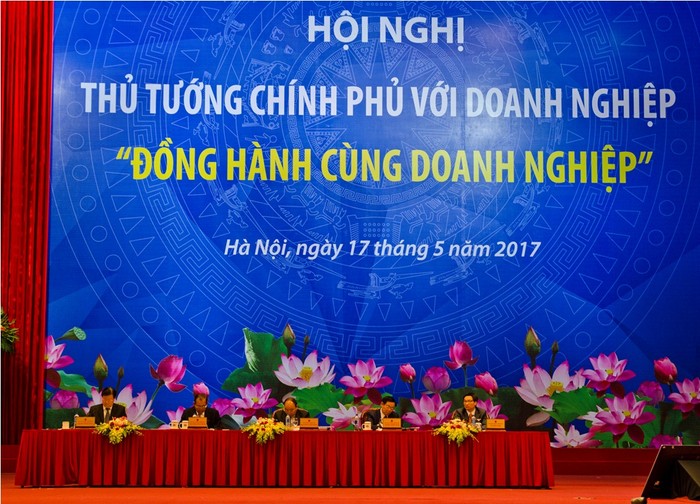 Thành viên Chính phủ điều hành Hội nghị Thủ tướng Chính phủ với doanh nghiệp năm 2017 - ảnh: Hoàng Lực.