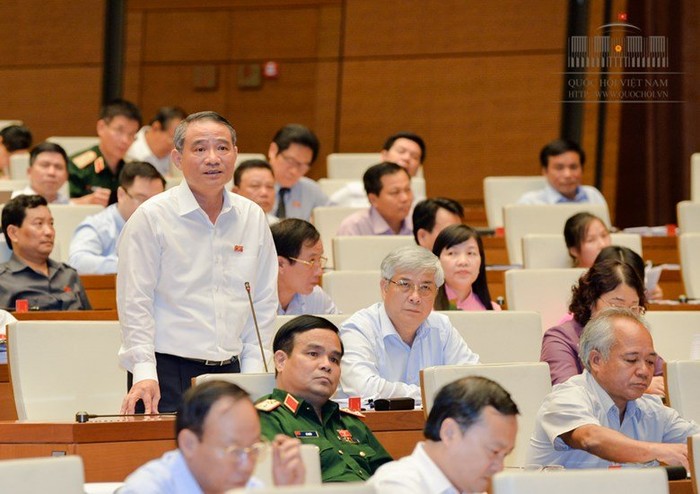 Trả lời chất trước Quốc hội, Bộ trưởng Bộ Giao thông vận tải - ông Trương Quang Nghĩa cho biết, suất đầu tư cao tốc của Việt Nam thấp hơn nhiều nước trên thế giới - ảnh Trung tâm thông tin Quốc hội.