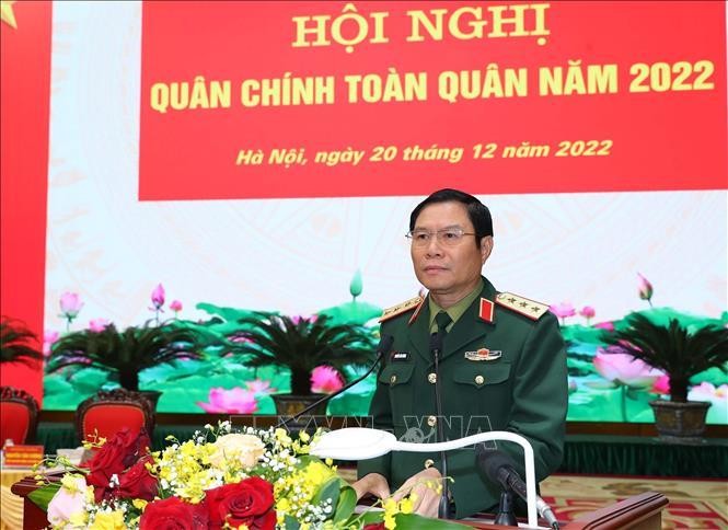 Thượng tướng Nguyễn Tân Cương, Tổng Tham mưu trưởng Quân đội nhân dân Việt Nam, Thứ trưởng Bộ Quốc phòng đọc báo cáo tại hội nghị. Ảnh: Trọng Đức/TTXVN