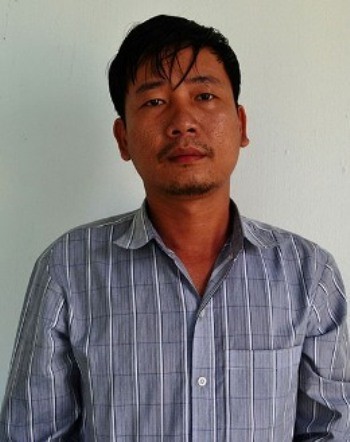Bị cáo Phan Văn Quy bị kết tội tổ chức người khác trốn đi nước ngoài trái phép (ảnh Ngọc Xanh)