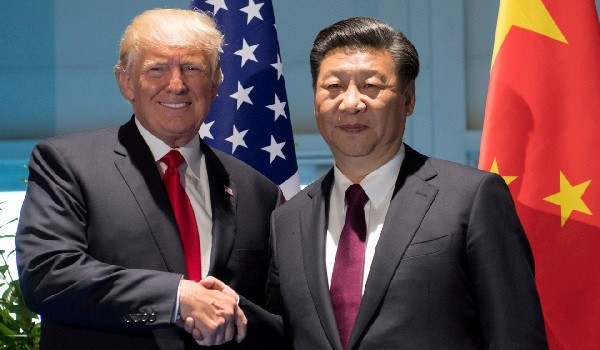 Tổng thống Mỹ Donald Trump và Chủ tịch Trung Quốc Tập Cận Bình (Ảnh: Tân Hoa Xã)