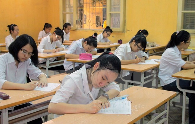 Thi tuyển sinh vào lớp 10 trung học phổ thông đang gây nhiều áp lực cho học sinh. (Ảnh minh họa: Bích Ngọc/TTXVN)