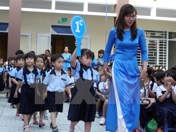 Tựu trường cũng là ngày khai giảng là điều rất có ý nghĩa với cả học sinh và giáo viên. (Ảnh minh hoạ: TTXVN)