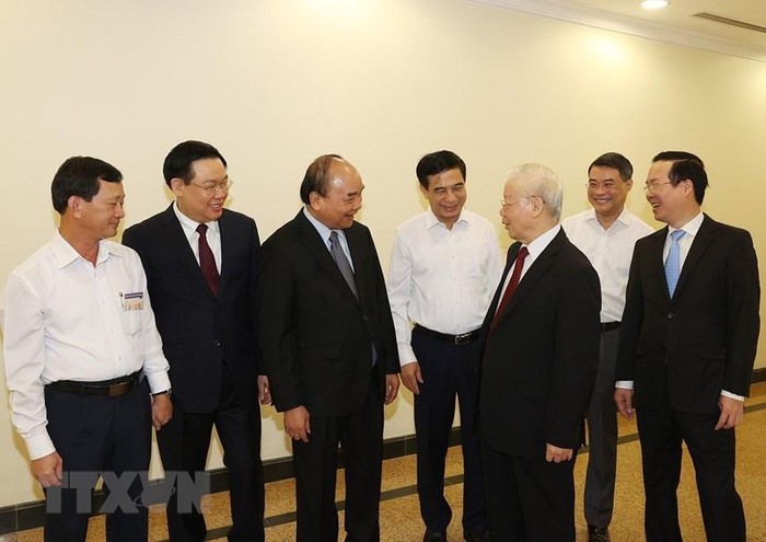 Tổng Bí thư Nguyễn Phú Trọng và các lãnh đạo Đảng, Nhà nước đến dự hội nghị. (Ảnh: Trí Dũng/TTXVN)