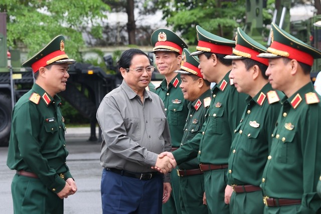 Thủ tướng Phạm Minh Chính làm việc với Tập đoàn Công nghiệp - Viễn thông Quân đội (Viettel). Ảnh: VGP/Nhật Bắc