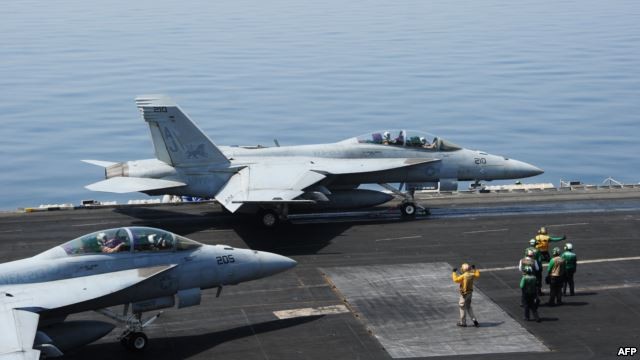 Ngày 8 tháng 8 năm 2014, máy bay chiến đấu F/A-18 cất cánh từ tàu sân bay USS George Bush CVN 77 tiến hành không kích tổ chức cực đoan ISIS Iraq