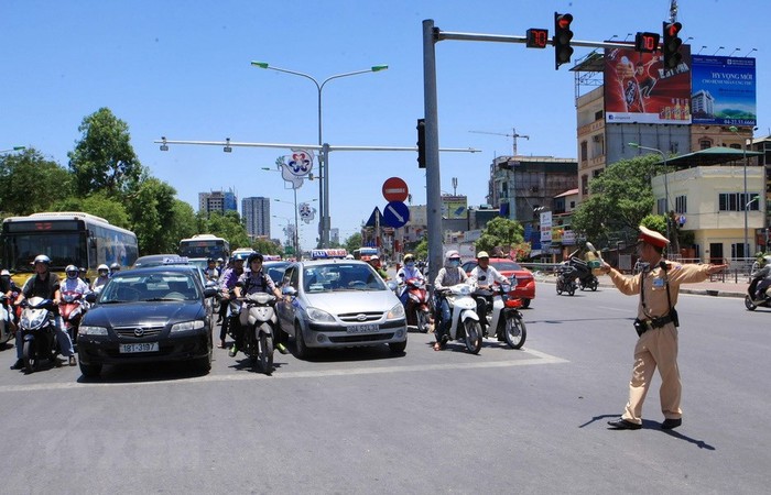 Chú trọng vận động nhân dân thực hiện: &quot;Đã uống rượu, bia - không lái xe&quot;; không phóng nhanh, vượt ẩu. Ảnh minh họa: Vietnamplus