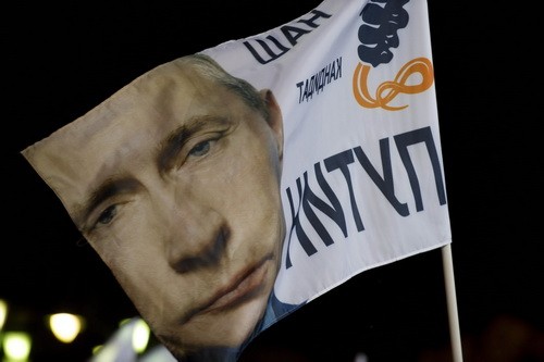 Thủ tướng Nga Vladimir Putin đã được xác nhận là người giành chiến thắng trong cuộc bầu cử hôm 4.3. Ảnh: AFP