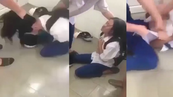 Nữ sinh bị bạo lực học đường ở Quảng Trị.. Ảnh cắt ra từ clip