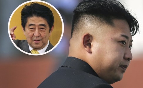 Thủ tướng Nhật Bản Shinzo Abe và nhà lãnh đạo Triều Tiên Kim Jong-un, ảnh: Bưu điện Hoa Nam/AP.