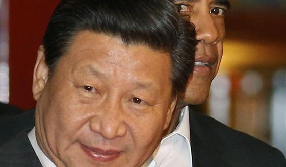 Ông Tập Cận Bình và ông Obama, ảnh: Kym Kyung-hoon/AP.