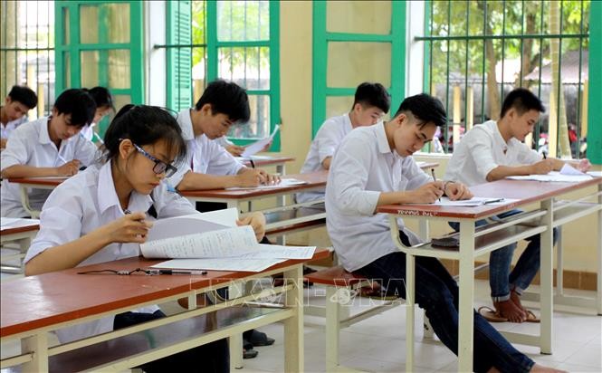 Học sinh làm bài kiểm tra (Ảnh minh họa: TTXVN).