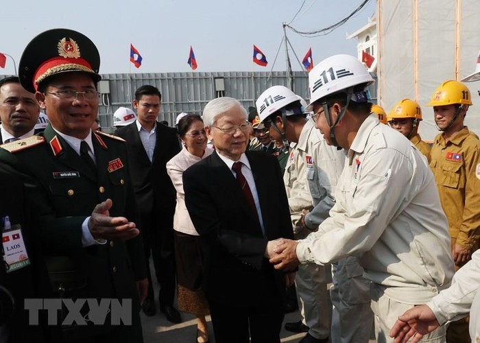 Tổng Bí thư, Chủ tịch nước Nguyễn Phú Trọng thăm dự án nhà quốc hội Lào. ảnh: TTXVN.