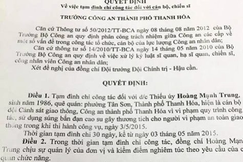 Quyết định đình chỉ công tác đối với thiếu úy Hoàng Mạnh Trung (ảnh XUÂN QUANG)