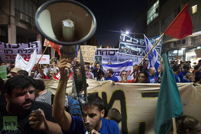 Người biểu tình Israel xuống đường kỷ niệm 1 năm ngày bắt đầu cuộc biểu tình chống bất công bằng xã hội tại Tel Aviv ngày 14/7.